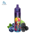 A colorful vape device labeled "FUMOT Tornado" with a skull design and surrounded by blueberries, blackberries, and green leaves.