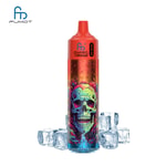 A colorful vape device with a skull design and a bright orange top, sitting on a bed of ice cubes. The branding "FUMOT" and "TORNADO" are visible on the device.