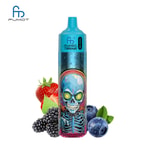 A vape device with a colorful skull design and bright green eyes, surrounded by strawberries, blackberries, and blueberries.
