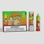 A colorful vape product packaging featuring a cartoon monkey wearing a cap, labeled "20,000 PUFFS STRAWBERRY NUT" with warnings about nicotine addiction. The package includes a vape device and contains a prominent warning label.