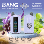 Advertisement for BANG LEADER vape device featuring a display screen, a double flavor option (black grape and green grape), up to 50,000 puffs, and icons for Type-C charging, 650mAh battery, dual mesh coil, and adjustable settings, with grapes and grape juice splashes in the background.
