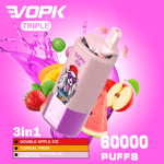 Promotional image for VOPK Triple vape device featuring a cartoon cat wearing sunglasses, surrounded by splashes of fruit juice, strawberries, apples, watermelon, and mango, with text highlighting flavors (Double Apple Ice, Topical Fruit, Strawberry Watermelon Bubble Gum) and advertising 60,000 puffs.