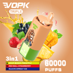 VOPK Triple 3-in-1 vape device featuring a lion graphic, surrounded by images of mango, pineapple, blackcurrant, and strawberry, and text highlighting three flavors and 60,000 puffs.
