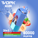 VOPK TRIPLE 3-in-1 vape device with a lion cartoon character on it, surrounded by images of watermelon, ice cream, guava, strawberries, and water splashes, advertising 60,000 puffs and flavors: watermelon, triple melon ice, and strawberry ice cream.