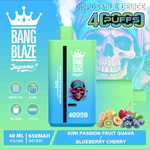 Advertisement for Bang Blaze Joycome disposable vape device in green and blue gradient colors, featuring bold text with product features, a skull wearing headphones illustration, images of kiwi, passion fruit, guava, blueberries, and cherries, and a 4000 puffs label.