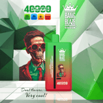Vape product packaging with a red and green gradient design, displaying a stylized illustration of a person wearing a suit and bow tie, key specifications like 650mAh battery and 40ml capacity, and the brand name 'Bang Blaze Color', against an abstract green geometric background.