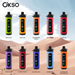 Nove dispositivos vape descartáveis ​​OKSO em diferentes cores e sabores, cada um rotulado com seu nome de sabor, exibidos contra um fundo de deserto sob um céu azul.