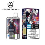 Crystal Twin 50K vape product showing a transparent device with astronaut artwork, 50,000 puffs label, flavor indicators, and packaging that displays flavors (Strawberry Banana, Love 66), double flavor feature, and a nicotine addiction warning.