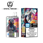 Crystal Twin 50K disposable vape device and packaging featuring a colorful astronaut design, labeled for 50,000 puffs, double flavor (Strawberry Watermelon and Lemon Lime), with a nicotine addiction warning label.