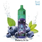 Disposable vape device with a green cap and a skull illustration, surrounded by blueberries, mint leaves, ice cubes, and splashing water, labeled 'Blueberry On Ice'.
