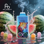 Colorful vape device with a neon leopard graphic and digital display, releasing vapor, set among splashing watermelons and fruit candy spheres with the brand logo "FUMOT" above.