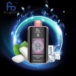 FUMOT Tornado vape device with digital display, surrounded by mint leaves, white gummy candies, and ice cubes, with a glowing blue circular background.
