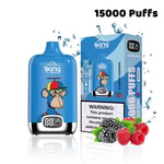 Bang Box disposable vape device in blue with a cartoon monkey and a propeller hat, next to its packaging labeled '15000 Puffs' and 'Blueberry Raspberry,' with images of blackberries and raspberries and a nicotine warning.