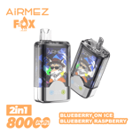 Two transparent AiRMEZ Fox pod devices displaying a colorful fox artwork, with an orange AiRMEZ Fox logo in the top left and bold orange '2in1 800 puffs' text, alongside flavor labels Blueberry on Ice and Blueberry Raspberry.