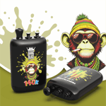 A black flask with a colorful cartoon monkey wearing sunglasses and a beaded necklace, smoking a cigarette, with bold "140K" text; another smaller black bottle lies nearby, both against a lime splash background and a colorful monkey illustration.