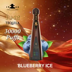 A tall dark bottle of 1942 Don Leon Tequila centered against a warm gold and red background with blue blueberries and green leaves, text advertising “30000 Puffs” and “Blueberry Ice.”