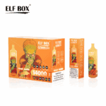 Opakowanie produktów do waporyzacji ELF BOX przedstawiające kreskówkową postać o zielonej skórze, okularach i pomarańczowych włosach, wraz z pudełkiem wskazującym smak "Peach Mango" i szczegółowymi informacjami na temat zaciągnięć na urządzenie.