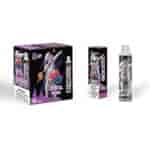 A display of a product packaging for a vaping device called "Crystal ProMax," featuring an illustration of an astronaut and flavors like raspberry and blueberry, with a warning label about nicotine addiction. The box holds 10 pieces and highlights "10000" prominently.