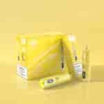 "Yellow vape packaging with 'Pineapple Coconut' flavor, 15000 puffs, and individual devices displayed."
