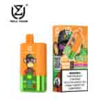 Einweg-Vape-Gerät mit drei Geschmacksrichtungen und einem Cartoon-Affen mit Sonnenbrille auf einem orange-grünen Gehäuse neben der Verpackung, auf der 60.000 Züge, drei Geschmacksrichtungen (Grape Ice, Love 666, Strawberry Red Bull) und eine Warnung vor Nikotinsucht hervorgehoben sind.