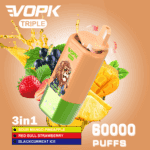 VOPK Triple 3-in-1-Vape-Gerät mit einer Löwengrafik, umgeben von Bildern von Mango, Ananas, schwarzer Johannisbeere und Erdbeere sowie Text, der drei Geschmacksrichtungen und 60.000 Züge hervorhebt.
