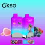 Two colorful OKSO branded vape devices with a purple-blue gradient, shown with fruit illustrations for Blue Razz and a heart icon for Love 66 flavor, alongside a cartoon ape character and mixed berries.