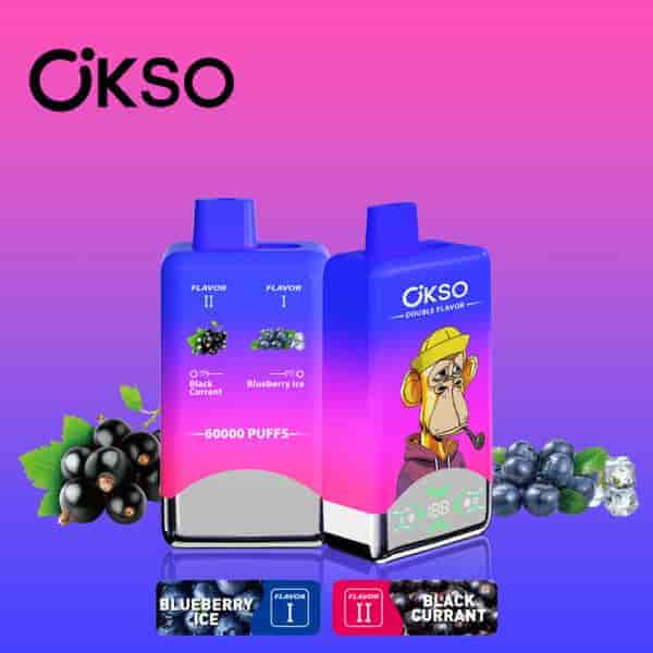 OKSO vape devices displaying blueberry ice and black currant double flavors, with images of black currant and blueberries, and a cartoon monkey wearing a hat on the packaging, set against a pink-purple gradient background.