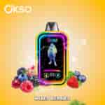 Colorful OKSO vape device with a neon-edged design featuring a stylish figure on its display, surrounded by a splash of water and assorted mixed berries including strawberries, blueberries, raspberries, and blackberries, on a yellow gradient background with the text 'Mixed Berries'.
