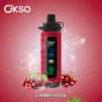 Red OKSO Shishai electronic device with a digital display, surrounded by cherries and splashes of water on a gradient red background, labeled Cherry Fiesta.