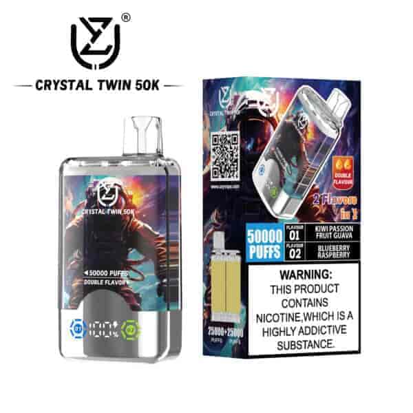 Crystal Twin 50K disposable vape device and packaging featuring a colorful astronaut design, 50,000 puff capacity, double flavor (kiwi passion fruit guava and blueberry raspberry), and a nicotine addiction warning label.