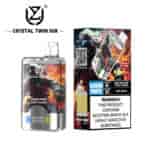 Crystal Twin 50K vape device and packaging featuring an astronaut illustration, offering 50,000 puffs with double flavor options (kiwi passion fruit guava and two apple), and a prominent nicotine addiction warning label.