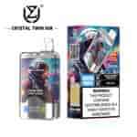 Crystal Twin 50K disposable vape with 50,000 puffs, double flavor of peach mango pineapple and red bull, astronaut artwork on the device and packaging, and a nicotine addiction warning label.