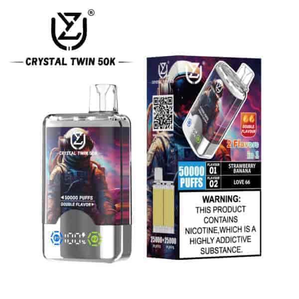 Crystal Twin 50K vape product showing a transparent device with astronaut artwork, 50,000 puffs label, flavor indicators, and packaging that displays flavors (Strawberry Banana, Love 66), double flavor feature, and a nicotine addiction warning.