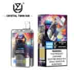 Crystal Twin 50K disposable vape device and packaging featuring a colorful astronaut illustration, indicating 50,000 puffs, double flavors (watermelon ice and mixed berries), and a nicotine addiction warning label.