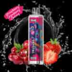 Vape jetable Uwin Crystal présentant un motif de singe coloré, représenté avec des fraises fraîches, des cerises, des canneberges et un peu d'eau, mettant en valeur la saveur de fraise, de canneberge et de cerise.