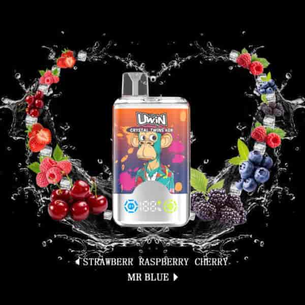 UWIN Crystal Twins vape device with a cartoon monkey design, surrounded by splashes of water, strawberries, raspberries, cherries, blueberries, and blackberries on a black background, highlighting flavors like strawberry, raspberry, cherry, and Mr Blue.