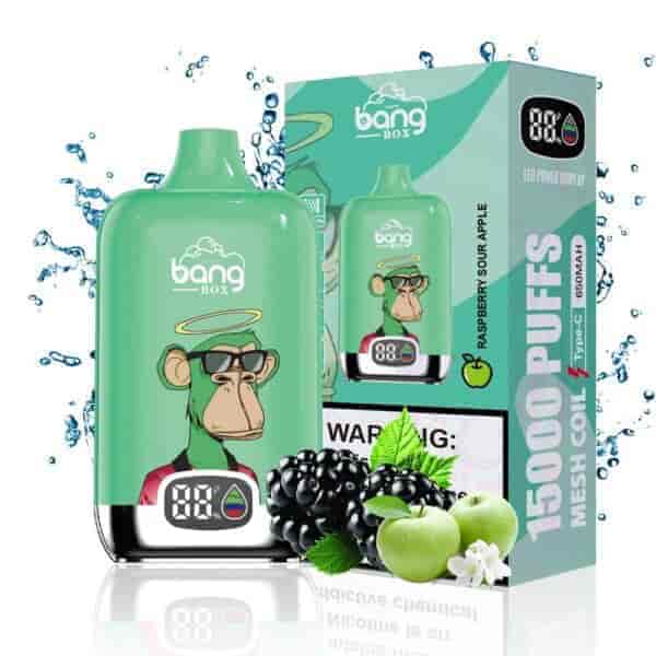 Bang Box disposable vape device with a cartoon monkey in sunglasses, digital power display, green apple and blackberry fruits, and packaging indicating raspberry sour apple flavor and 15,000 puffs.
