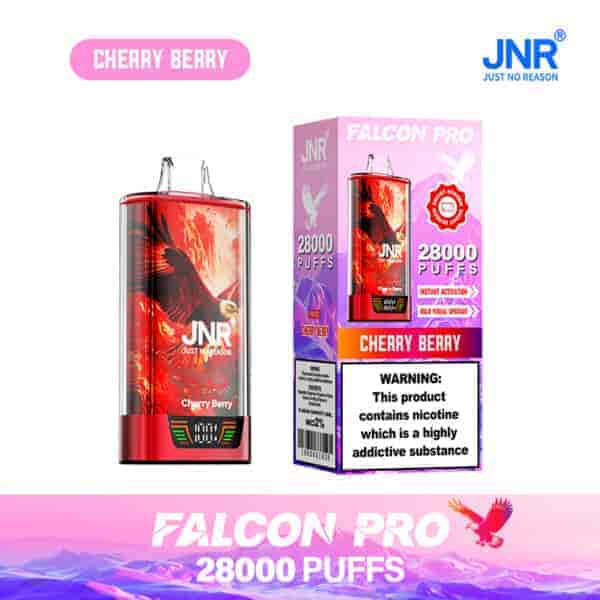 Appareil de vape jetable JNR Falcon Pro Cherry Berry et son emballage, présentant un design rouge vif avec un graphique d'aigle, étiqueté pour 28 000 bouffées et affichant un avertissement de dépendance à la nicotine.