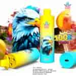 A vibrant disposable vape device from Bang King, featuring an artistic eagle design, labeled with '100K PUFFS' and 'Triple', surrounded by fruity ingredients like oranges and strawberries.
