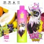 A colorful vape device labeled 'Bang King Vapen Triple' featuring an illustration of a hawk's head alongside a variety of fruits, with text indicating '3 in 1 Switch' and '100K Puffs'.