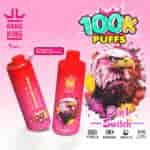 A vibrant pink advertisement featuring the Bang King Vape product, showcasing two cylindrical devices with a striking eagle illustration, highlighting features like '100K Puffs' and '3 in 1 Switch' with colorful text and icons for user instructions and specifications.