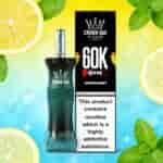 Vape Crown Bar 60K EhoSex Lemon Mint con botella curvada en color negro verdoso junto a una caja negra, rodeada de rodajas de limón y menta fresca sobre un fondo degradado brillante.