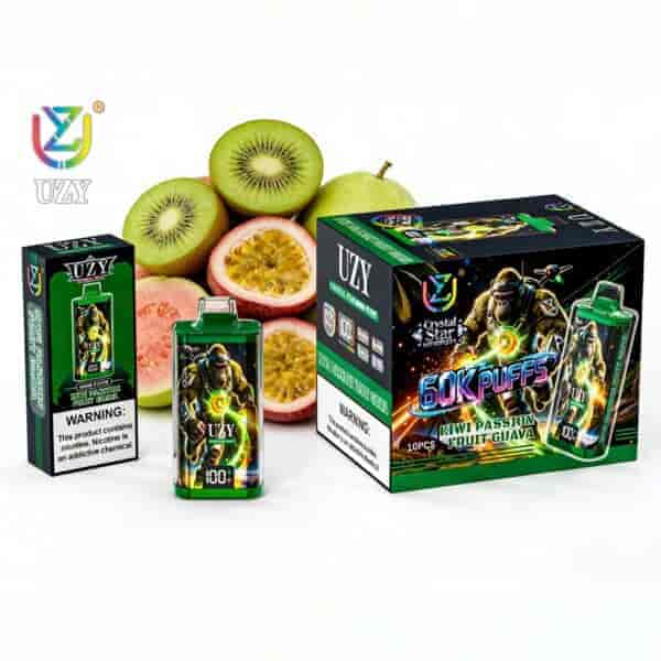 Assorted UZY vape product boxes and a bottle, with sliced kiwi and passion fruit in the background.