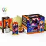 Colorful UZY branded vape product packaging with a central device and a large box reading “50K PUFFS” beside fruits (melon, watermelon, passion fruit).