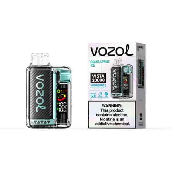 Appareil de vape de type pod Vozol Vista 20000 avec motif en fibre de carbone, accents de menthe et panneau d'affichage à côté d'une boîte assortie étiquetée “ SOUR APPLE ICE ” et un texte d'avertissement.