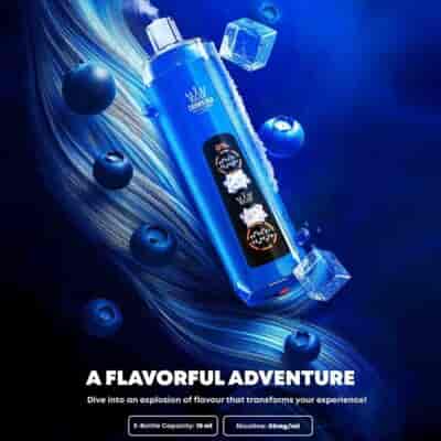 Blue cylindrical e-cigarette device with a black display, surrounded by ice cubes and blueberries, set against a blue splash background.