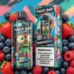 Bottle and box of Razi Bar vape juice with colorful berry artwork, featuring a cartoon monster and fruits like strawberries, blueberries, and raspberries against a bright abstract background.