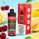 Appareil à vape RazBār cerise et citron avec une bouteille à motifs rouges à côté de sa boîte, comportant un graphique de démon et une étiquette d'avertissement.
