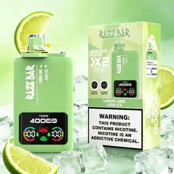 Lemon-lime RAZZ BAR 40000 puff vape with a green rectangular device, display screen showing graphics, next to its box, surrounded by ice and lime slices.