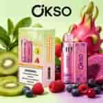 Colorful OKSO e-cigarette packaging and devices with kiwi, dragon fruit, raspberries, blueberries, and kiwi slices in a vibrant fruit-themed display.